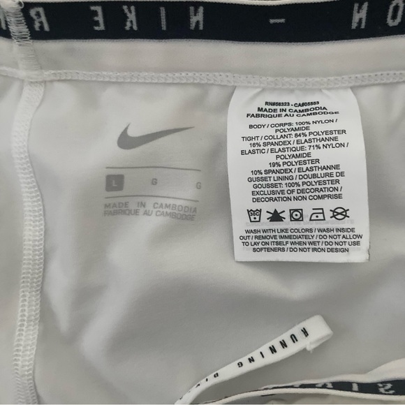 Nike White Athletic Shorts with Elastic Waistband and Curved Hem - Picture 8 of 11